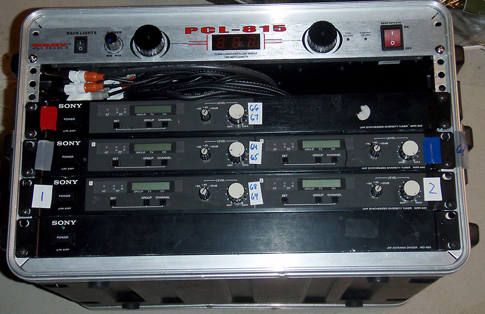 Five Sony receivers mounted for external Mackie mixing for live audience show.